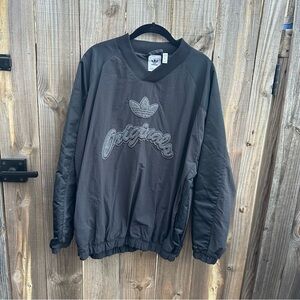 adidas Originals Tonal Textures collegiate windbreaker in black size Large